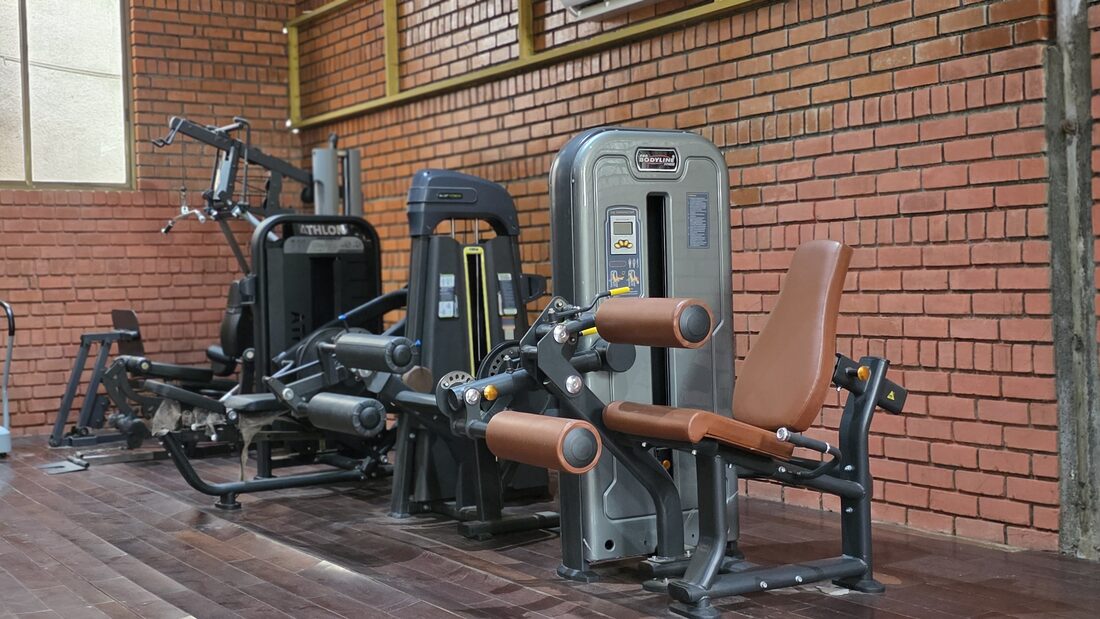 Equipped fitness centre with strength machines at UVA Meridian