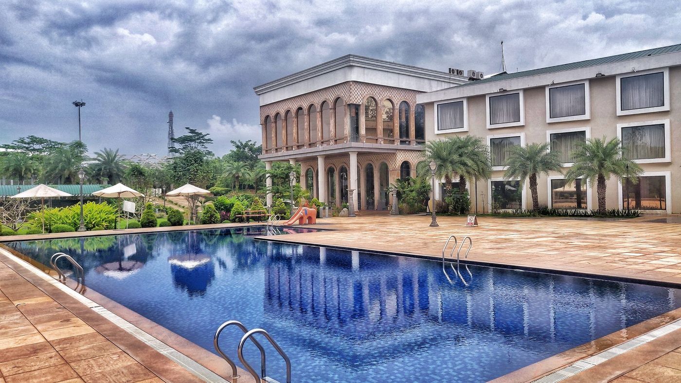 Main resort building and outdoor pool at UVA Meridian Bay Resort
