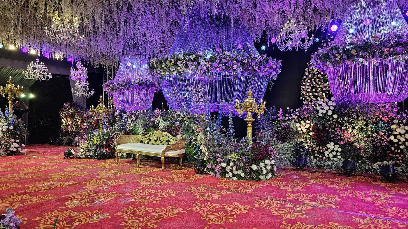 Wedding stage and floral décor at the Banyan Tree venue, UVA Meridian